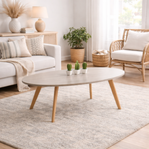 Table basse ovale en bois au design moderne, intégrée dans un salon cozy et lumineux.