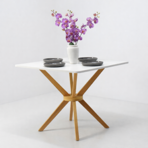 Table à manger moderne avec plateau blanc et base en bois naturel, décorée avec vase floral – Tunisie