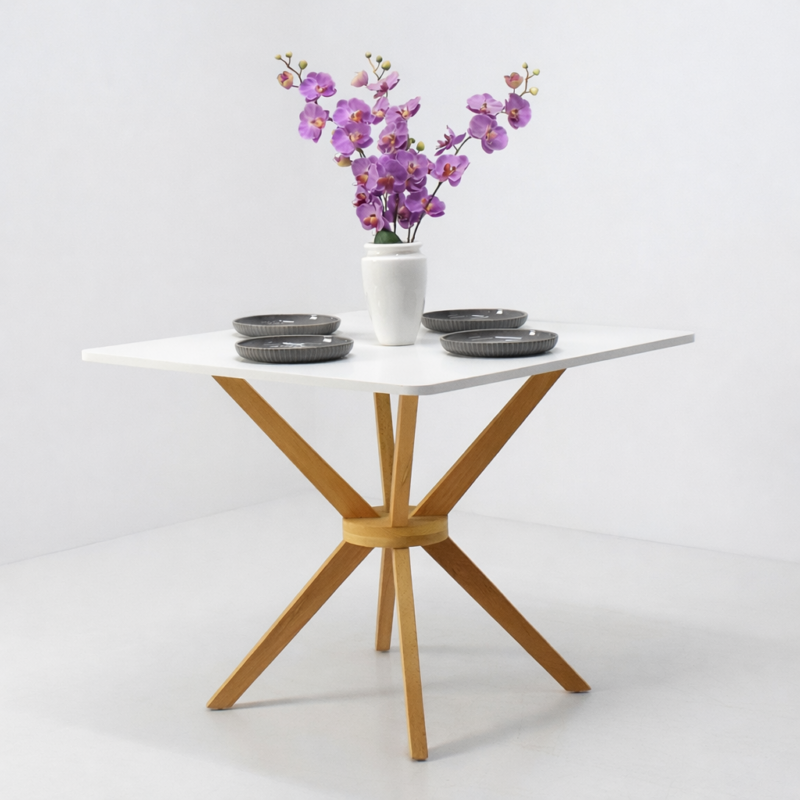 Table à manger moderne avec plateau blanc et base en bois naturel, décorée avec vase floral – Tunisie