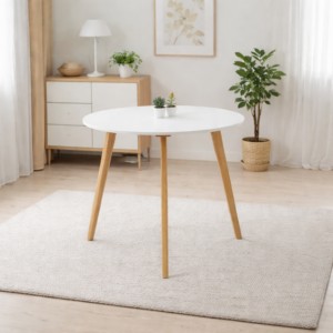 Table ronde blanche avec pieds en bois naturel intégrée dans un intérieur scandinave lumineux, décor minimaliste et épuré