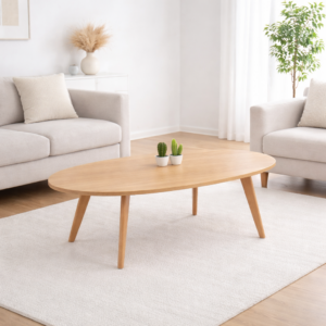Table basse ovale en bois clair intégrée dans un salon moderne et minimaliste avec canapé beige et tapis clair – Tunisie