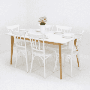 Salle à manger blanche moderne avec table rectangulaire et six chaises blanches, pieds bois naturel et décoration florale – Disponible en Tunisie.