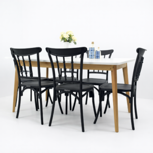 Salle à manger moderne avec table blanche et six chaises noires, design élégant avec pieds en bois naturel – Disponible en Tunisie.