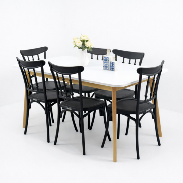 Salle à manger moderne avec table blanche et six chaises noires, design élégant avec pieds en bois naturel – Disponible en Tunisie.