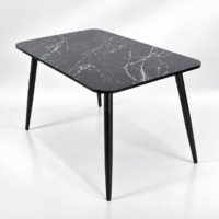 Table à manger rectangulaire noire avec plateau effet marbre dans un décor minimaliste lumineux