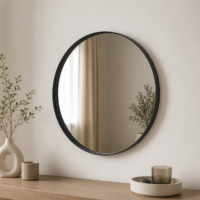 Miroir rond mural avec cadre noir au design moderne, idéal pour la salle de bain, l'entrée, le salon ou la chambre.