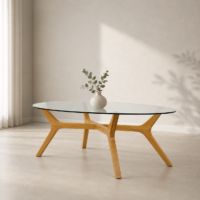 Table basse ovale avec plateau en verre transparent et pieds en bois massif dans un décor minimaliste moderne, idéale pour un salon contemporain.