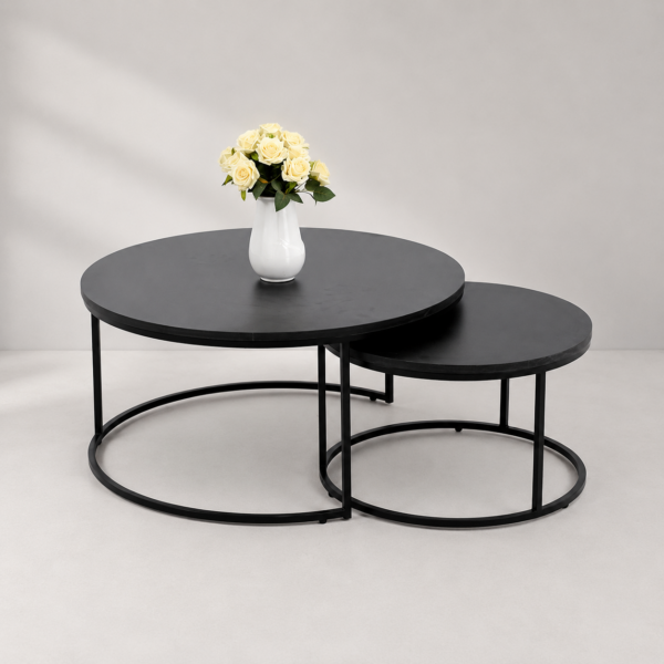 Ensemble de deux tables basses gigognes rondes noires au design moderne avec structure métallique.